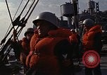 Standbild United States Marines hinabsteigen Gepäcknetzen Okinawa Japan, 1961, aus Sekunde 50 historischem Filmmaterial Videoclip 65675047857