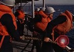 Standbild United States Marines hinabsteigen Gepäcknetzen Okinawa Japan, 1961, aus Sekunde 52 historischem Filmmaterial Videoclip 65675047857