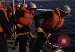 Standbild United States Marines hinabsteigen Gepäcknetzen Okinawa Japan, 1961, aus Sekunde 59 historischem Filmmaterial Videoclip 65675047857