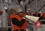 Standbild United States Marines hinabsteigen Gepäcknetzen Okinawa Japan, 1961, aus Sekunde 62 historischem Filmmaterial Videoclip 65675047857