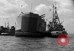 Image of rhino barge Normandy France, 1944, second 62 stock footage video 65675047862