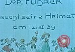 Image of Hitler visits his home village and house where he lived Leonding Austria, 1939, second 1 stock footage video 65675048062