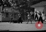 Immagine di Gli atleti olimpici nella formazione 1936 Elstal Wustermark Germania, 1936, secondo 21 filmato di repertorio 65675048118