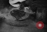 Image of Rubber goods factory in early 1900s America United States USA, 1925, second 26 stock footage video 65675048135