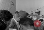 Image of Howard Hughes arrives in Douglas B-23 Dragon aircraft Washington DC USA, 1947, second 46 stock footage video 65675048172