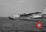 Image of Hughes H 4 Hercules flying boat Spruce Goose under full power United States USA, 1947, second 12 stock footage video 65675048184
