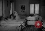 Image of maternity ward Spain, 1942, second 5 stock footage video 65675048270