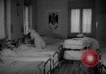 Image of maternity ward Spain, 1942, second 6 stock footage video 65675048270