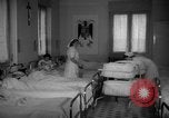 Image of maternity ward Spain, 1942, second 8 stock footage video 65675048270