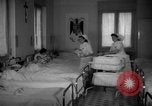 Image of maternity ward Spain, 1942, second 11 stock footage video 65675048270