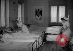 Image of maternity ward Spain, 1942, second 14 stock footage video 65675048270