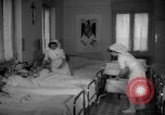 Image of maternity ward Spain, 1942, second 15 stock footage video 65675048270