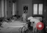 Image of maternity ward Spain, 1942, second 16 stock footage video 65675048270