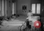 Image of maternity ward Spain, 1942, second 17 stock footage video 65675048270