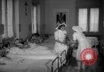 Image of maternity ward Spain, 1942, second 20 stock footage video 65675048270