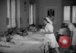 Image of maternity ward Spain, 1942, second 23 stock footage video 65675048270