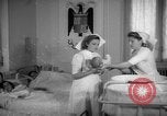 Image of maternity ward Spain, 1942, second 25 stock footage video 65675048270
