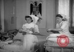 Image of maternity ward Spain, 1942, second 26 stock footage video 65675048270