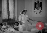 Image of maternity ward Spain, 1942, second 31 stock footage video 65675048270