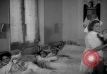 Image of maternity ward Spain, 1942, second 33 stock footage video 65675048270