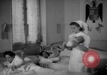 Image of maternity ward Spain, 1942, second 34 stock footage video 65675048270
