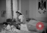 Image of maternity ward Spain, 1942, second 35 stock footage video 65675048270