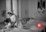 Image of maternity ward Spain, 1942, second 43 stock footage video 65675048270