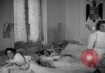 Image of maternity ward Spain, 1942, second 46 stock footage video 65675048270