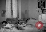 Image of maternity ward Spain, 1942, second 47 stock footage video 65675048270