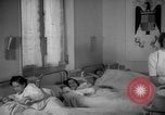 Image of maternity ward Spain, 1942, second 48 stock footage video 65675048270