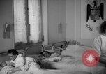 Image of maternity ward Spain, 1942, second 51 stock footage video 65675048270