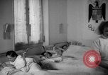 Image of maternity ward Spain, 1942, second 52 stock footage video 65675048270