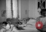 Image of maternity ward Spain, 1942, second 53 stock footage video 65675048270