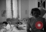 Image of maternity ward Spain, 1942, second 54 stock footage video 65675048270