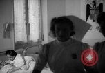 Image of maternity ward Spain, 1942, second 56 stock footage video 65675048270
