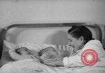 Image of maternity ward Spain, 1942, second 57 stock footage video 65675048270