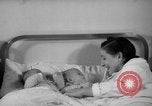 Image of maternity ward Spain, 1942, second 58 stock footage video 65675048270