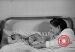 Image of maternity ward Spain, 1942, second 59 stock footage video 65675048270