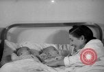 Image of maternity ward Spain, 1942, second 60 stock footage video 65675048270