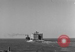Image of concrete barge Portsmouth England United Kingdom, 1944, second 1 stock footage video 65675048316