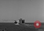 Image of concrete barge Portsmouth England United Kingdom, 1944, second 3 stock footage video 65675048316