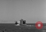 Image of concrete barge Portsmouth England United Kingdom, 1944, second 4 stock footage video 65675048316