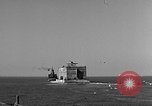 Image of concrete barge Portsmouth England United Kingdom, 1944, second 11 stock footage video 65675048316