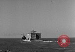 Image of concrete barge Portsmouth England United Kingdom, 1944, second 14 stock footage video 65675048316