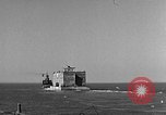 Image of concrete barge Portsmouth England United Kingdom, 1944, second 18 stock footage video 65675048316