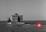 Image of concrete barge Portsmouth England United Kingdom, 1944, second 19 stock footage video 65675048316
