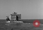 Image of concrete barge Portsmouth England United Kingdom, 1944, second 21 stock footage video 65675048316