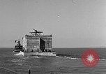 Image of concrete barge Portsmouth England United Kingdom, 1944, second 22 stock footage video 65675048316