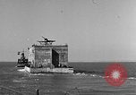 Image of concrete barge Portsmouth England United Kingdom, 1944, second 24 stock footage video 65675048316