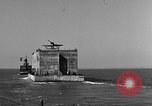 Image of concrete barge Portsmouth England United Kingdom, 1944, second 25 stock footage video 65675048316